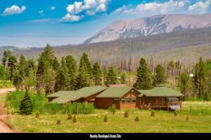 2.5 Acre Pre-Cleared Hillside Lot With Underground Utilities In Upscale Forested Community