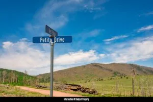 2.5 Acre Pre-Cleared Hillside Lot With Underground Utilities In Upscale Forested Community