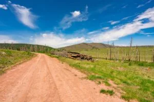 2.5 Acre Pre-Cleared Hillside Lot With Underground Utilities In Upscale Forested Community