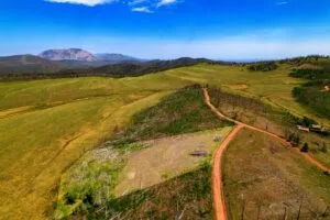 2.5 Acre Pre-Cleared Hillside Lot With Underground Utilities In Upscale Forested Community