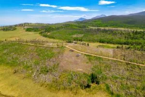 2.5 Acre Pre-Cleared Hillside Lot With Underground Utilities In Upscale Forested Community