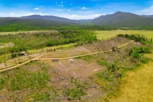2.5 Acre Pre-Cleared Hillside Lot With Underground Utilities In Upscale Forested Community