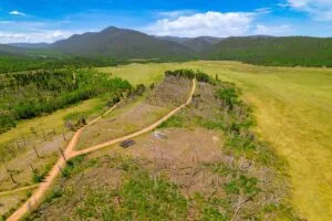 2.5 Acre Pre-Cleared Hillside Lot With Underground Utilities In Upscale Forested Community