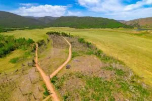 2.5 Acre Pre-Cleared Hillside Lot With Underground Utilities In Upscale Forested Community
