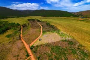 2.5 Acre Pre-Cleared Hillside Lot With Underground Utilities In Upscale Forested Community